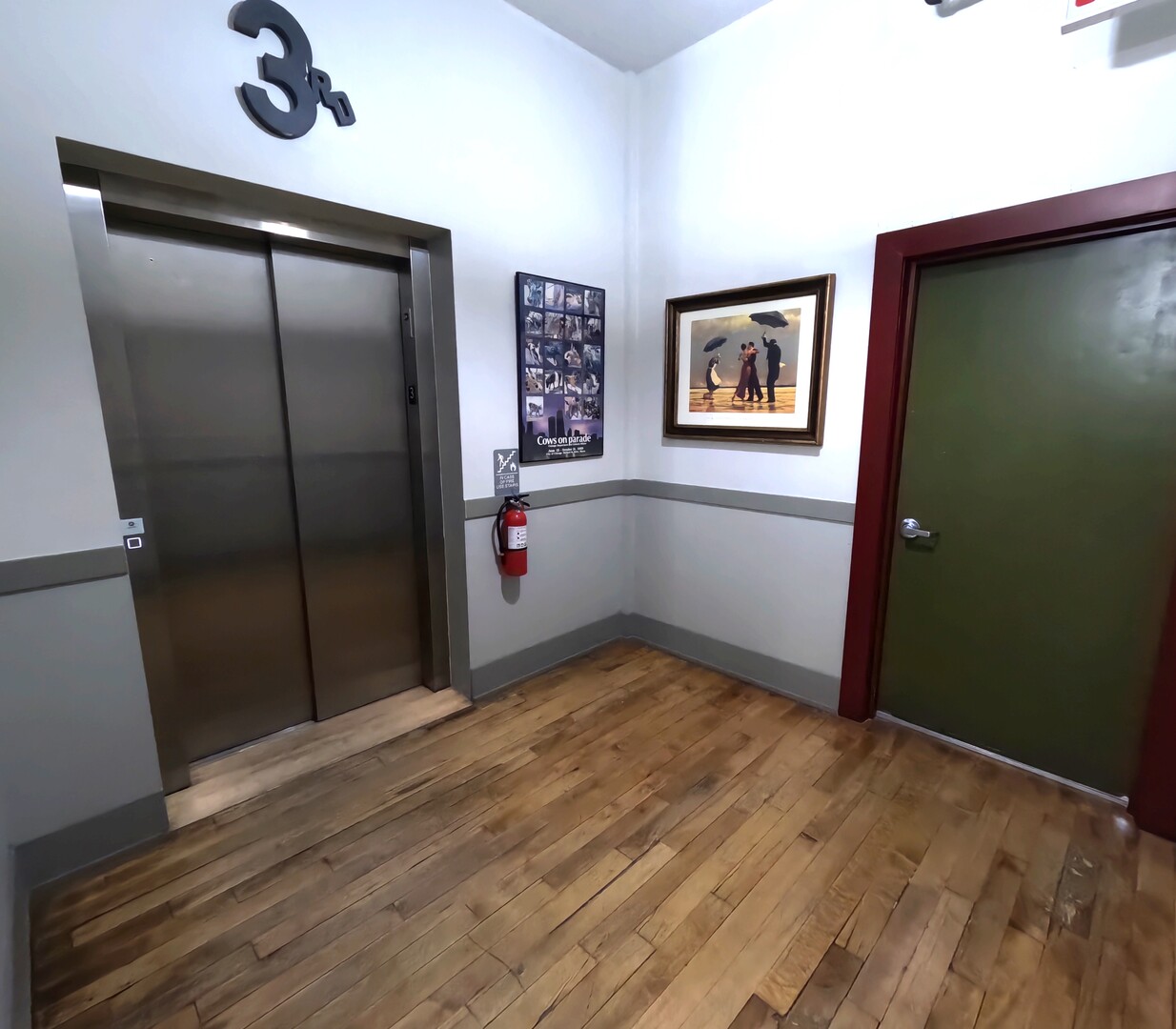 1432 West 21st Street, Unit 321 Chicago, IL 60608 - Photo 21 of 25 a view of a hallway with wooden floor and cabinet