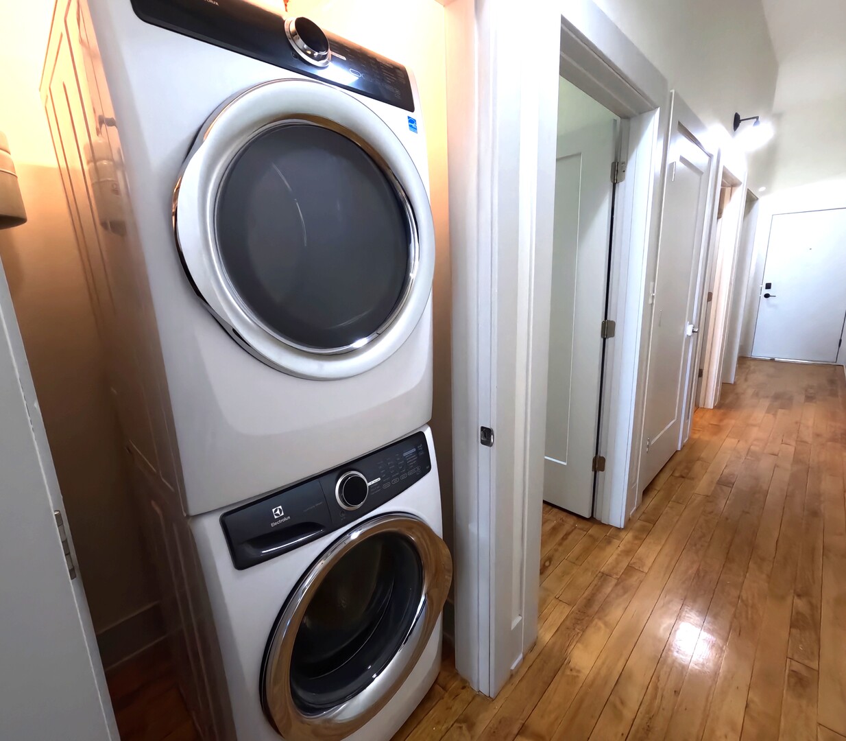 1432 West 21st Street, Unit 321 Chicago, IL 60608 - Photo 8 of 25 a view of a hallway with washer and dryer
