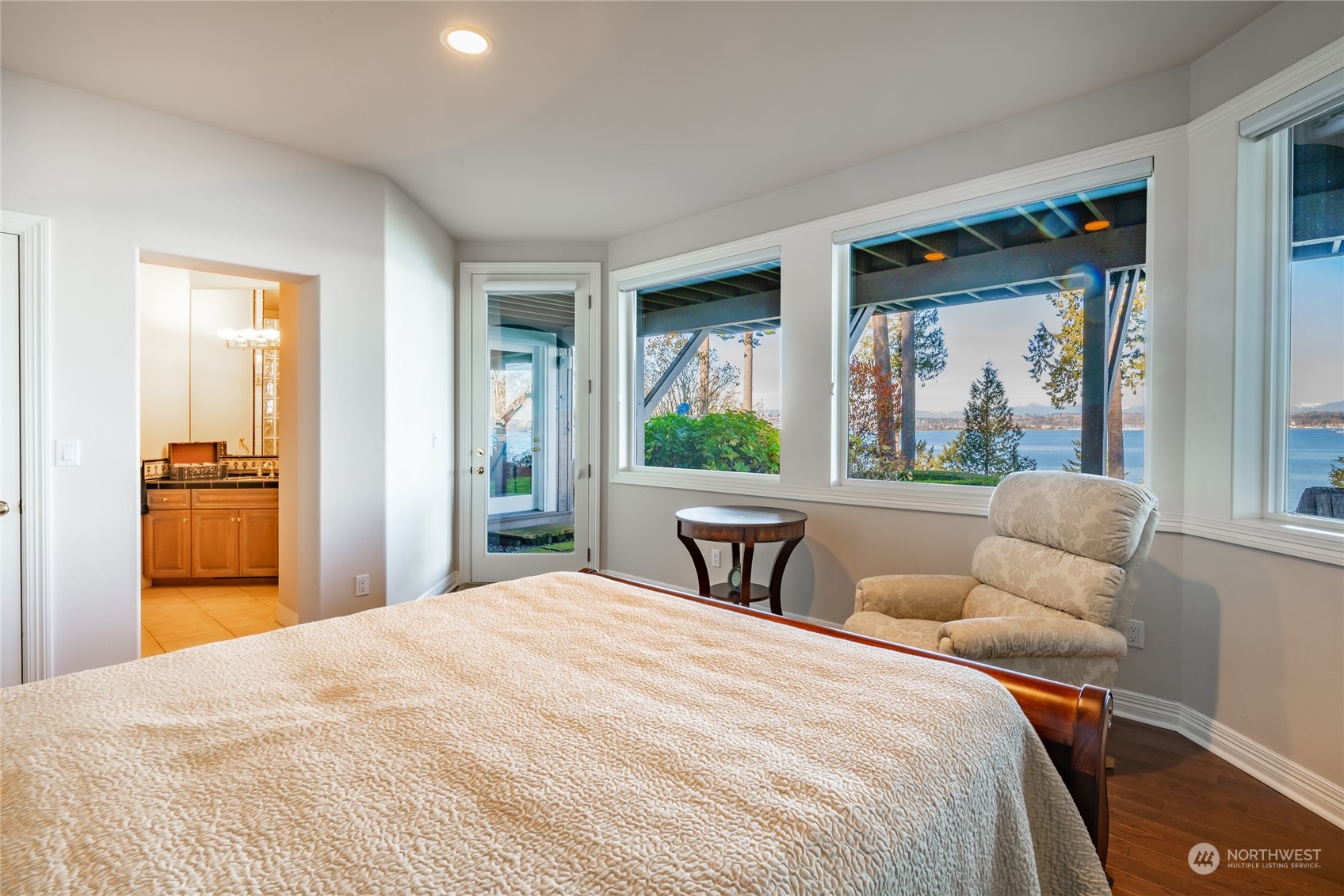 5436 Night Heron Drive Blaine, WA 98230 - Photo 27 of 40 a bedroom with a large bed and a large window