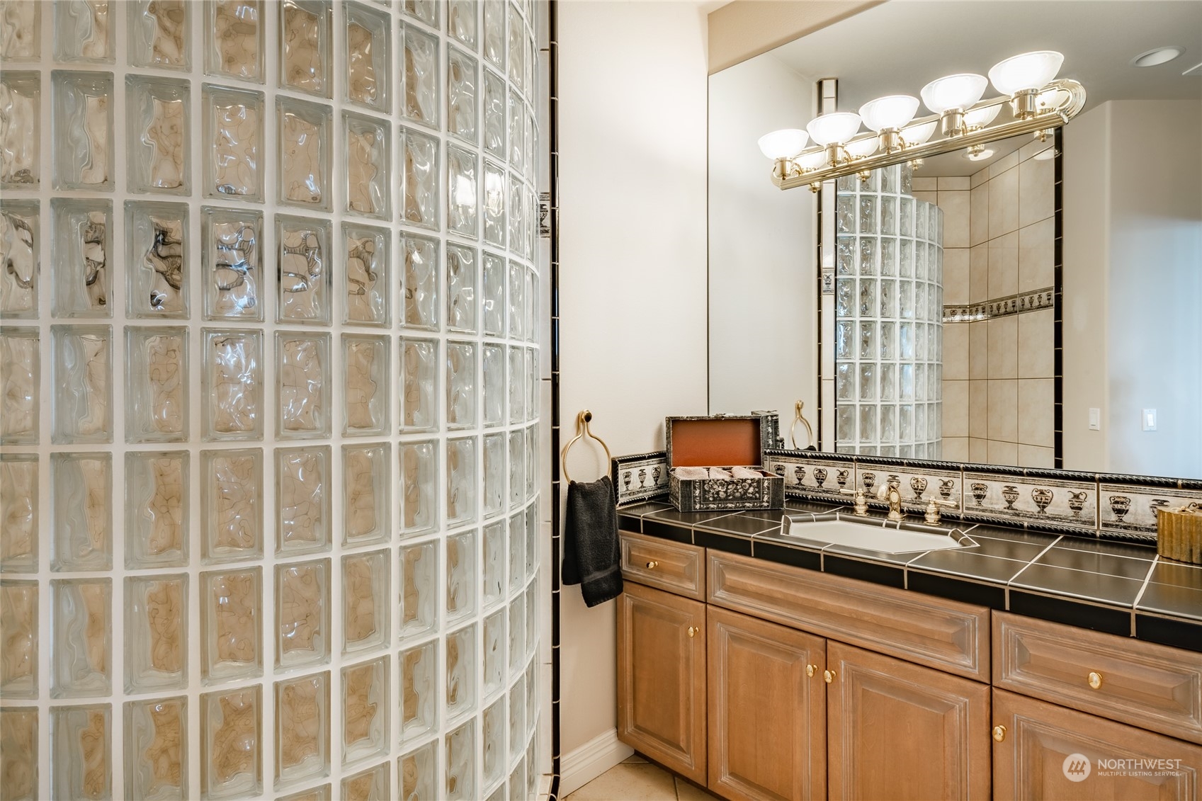 5436 Night Heron Drive Blaine, WA 98230 - Photo 28 of 40 a bathroom with a sink and a mirror