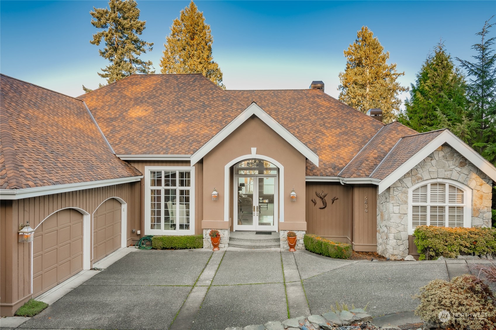 5436 Night Heron Drive Blaine, WA 98230 - Photo 3 of 40 a front view of a house with a yard and garage