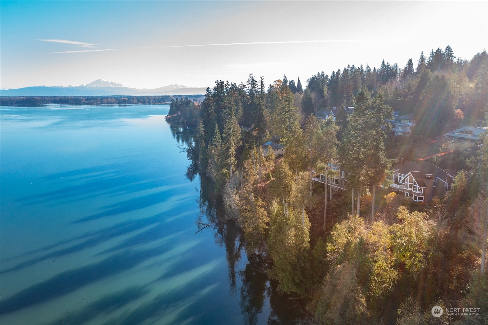 5436 Night Heron Drive Blaine, WA 98230 - Photo 35 of 40 a view of a lake with houses in back