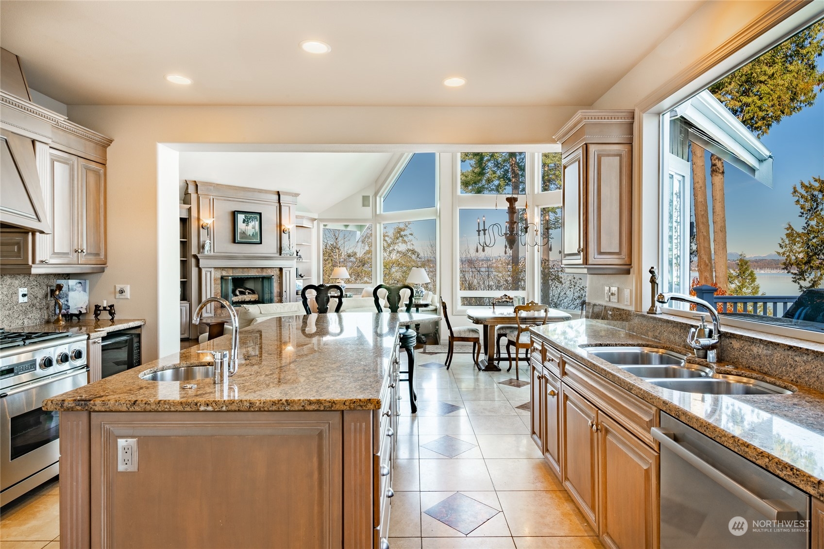 5436 Night Heron Drive Blaine, WA 98230 - Photo 9 of 40 a kitchen with counter top space a sink and cabinets