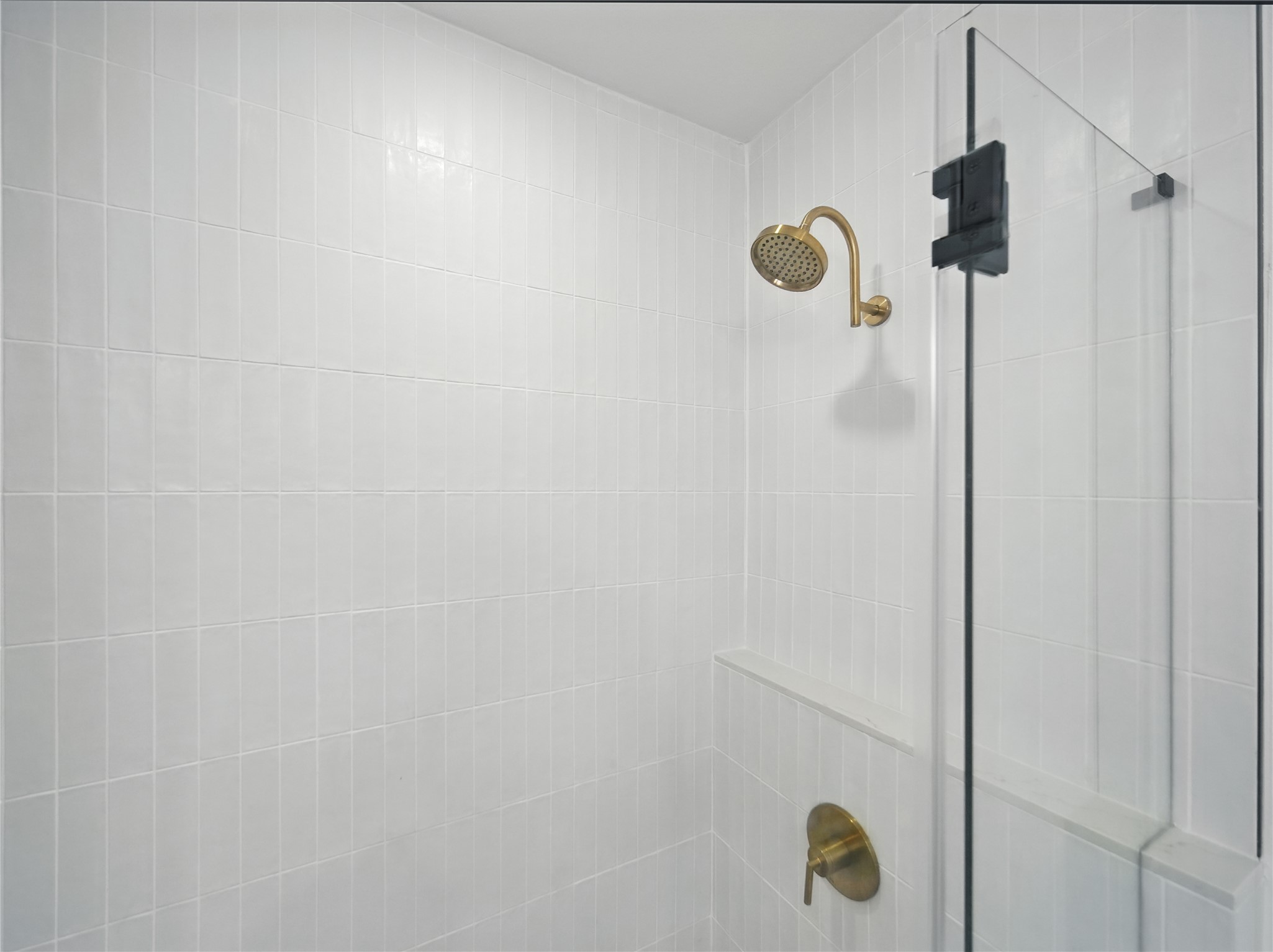 1701 Simond Avenue, Unit 302 Austin, TX 78723 - Photo 11 of 28 a bathroom with a shower