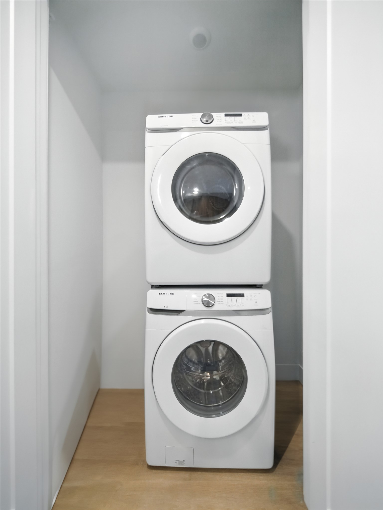 1701 Simond Avenue, Unit 302 Austin, TX 78723 - Photo 13 of 28 a utility room with dryer and washer