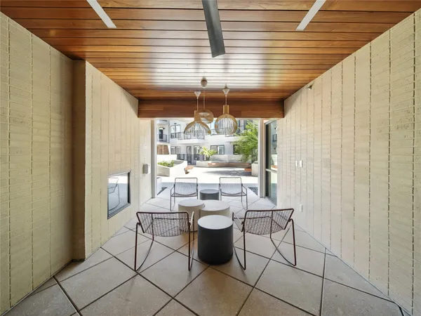 a view of a swimming pool with a lounge chair