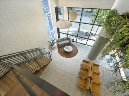 a view of a chairs and table in a patio