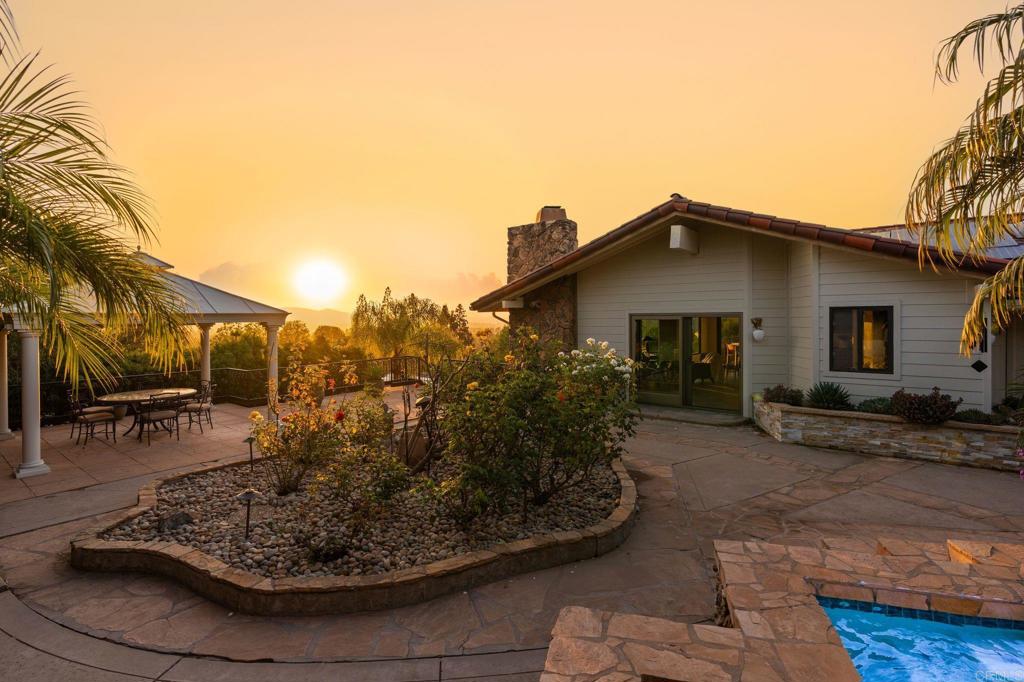 13319 Pacer Lane Poway, CA 92064 - Photo 63 of 75 a view of a house with backyard and sitting area