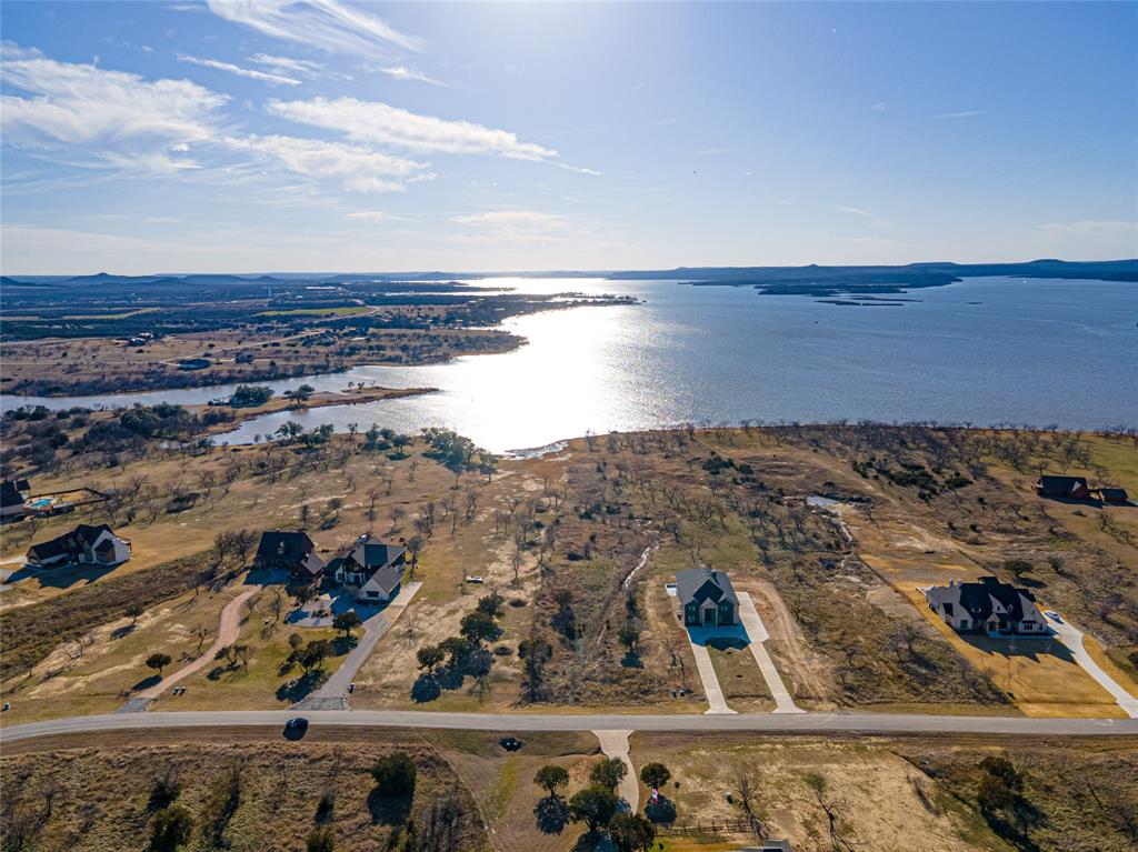Lot 932 Frog Branch Graford, TX 76449 - Photo 11 of 25 Drone / aerial view with a water view