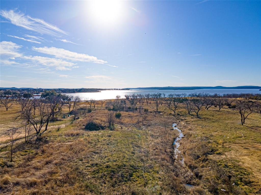 Lot 932 Frog Branch Graford, TX 76449 - Photo 14 of 25 Bird's eye view featuring a water view and a rural view