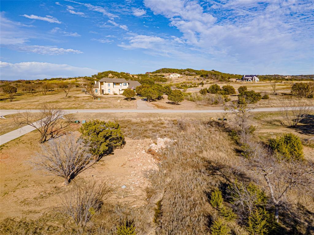 Lot 932 Frog Branch Graford, TX 76449 - Photo 17 of 25 Drone / aerial view with a rural view