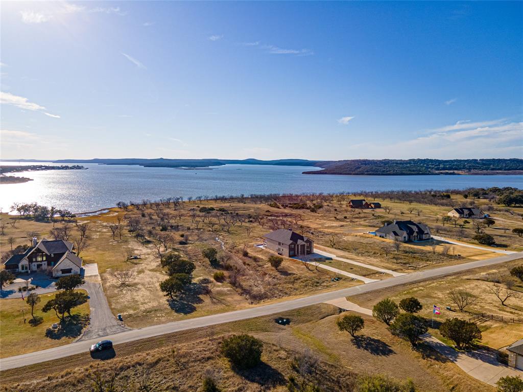 Lot 932 Frog Branch Graford, TX 76449 - Photo 4 of 25 Birds eye view of property with a water and mountain view