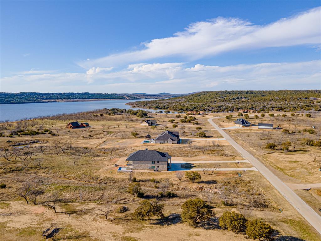 Lot 932 Frog Branch Graford, TX 76449 - Photo 5 of 25 Aerial view featuring a water view
