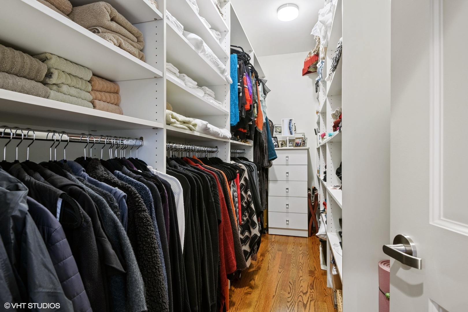 1155 North Dearborn Street, Unit 1003 Chicago, IL 60610 - Photo 16 of 28 a view of walk in closet with clothes and shoes