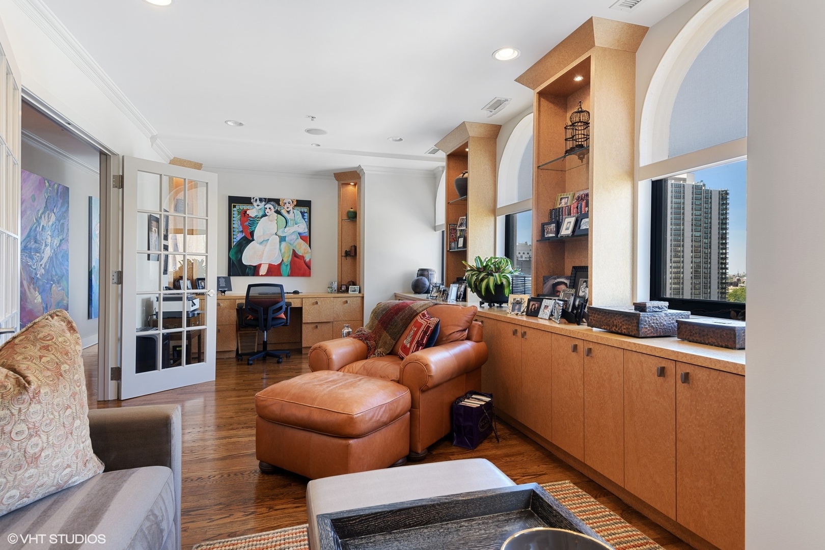 1155 North Dearborn Street, Unit 1003 Chicago, IL 60610 - Photo 9 of 28 a living room with furniture a rug and a window