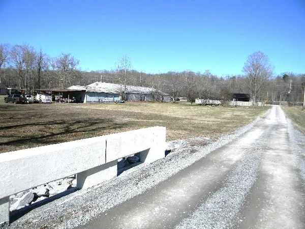 a view of a town with mountains in the background