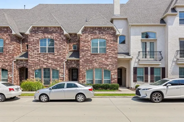 a car parked in front of a house