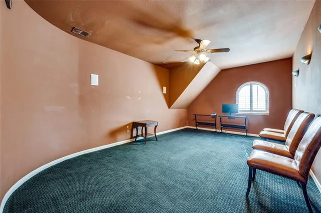 a view of livingroom with hardwood floor and ceiling fan