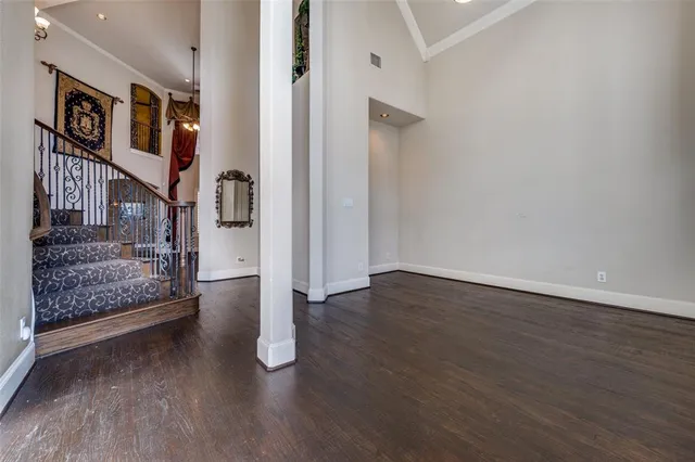 a view of an entryway with wooden floor