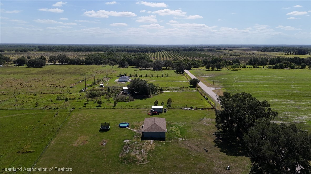 565 Stephens Road Wauchula, FL 33873 - Photo 29 of 36 an aerial view of a house with a yard