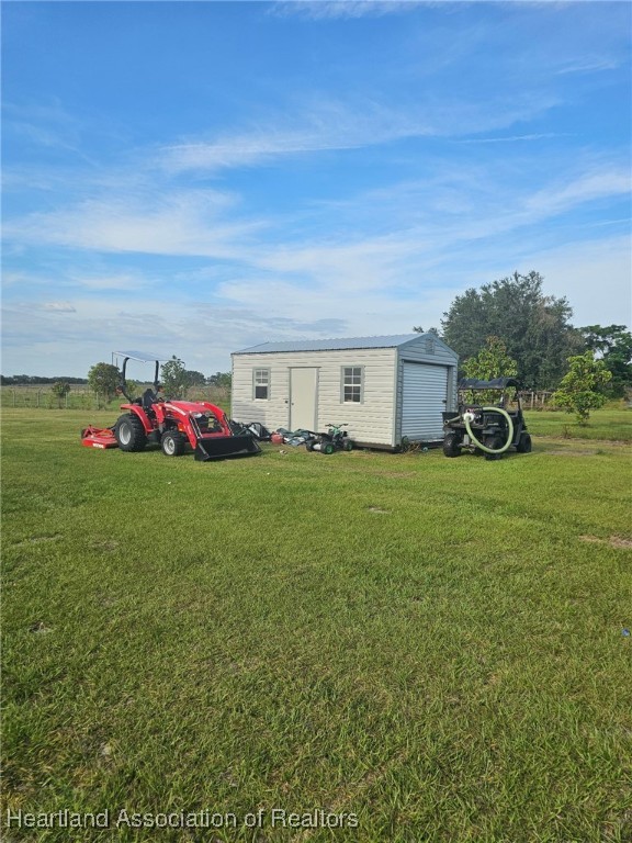 565 Stephens Road Wauchula, FL 33873 - Photo 36 of 36 a view of a house with a big yard