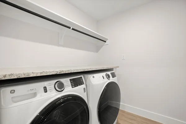 a utility room with dryer and washer