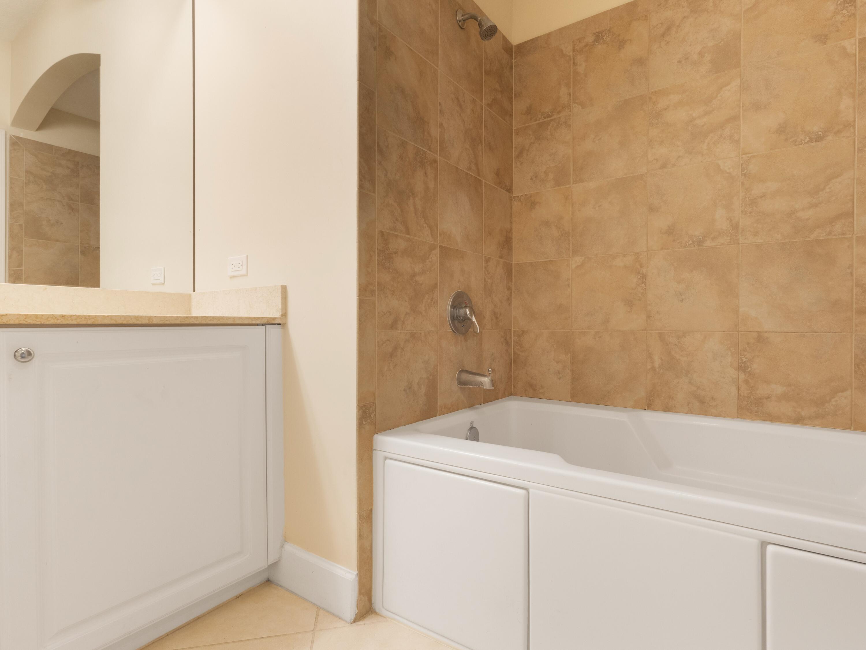 1690 Renaissance Commons Boulevard, Unit 1412 Boynton Beach, FL 33426 - Photo 16 of 42 Guest Bath