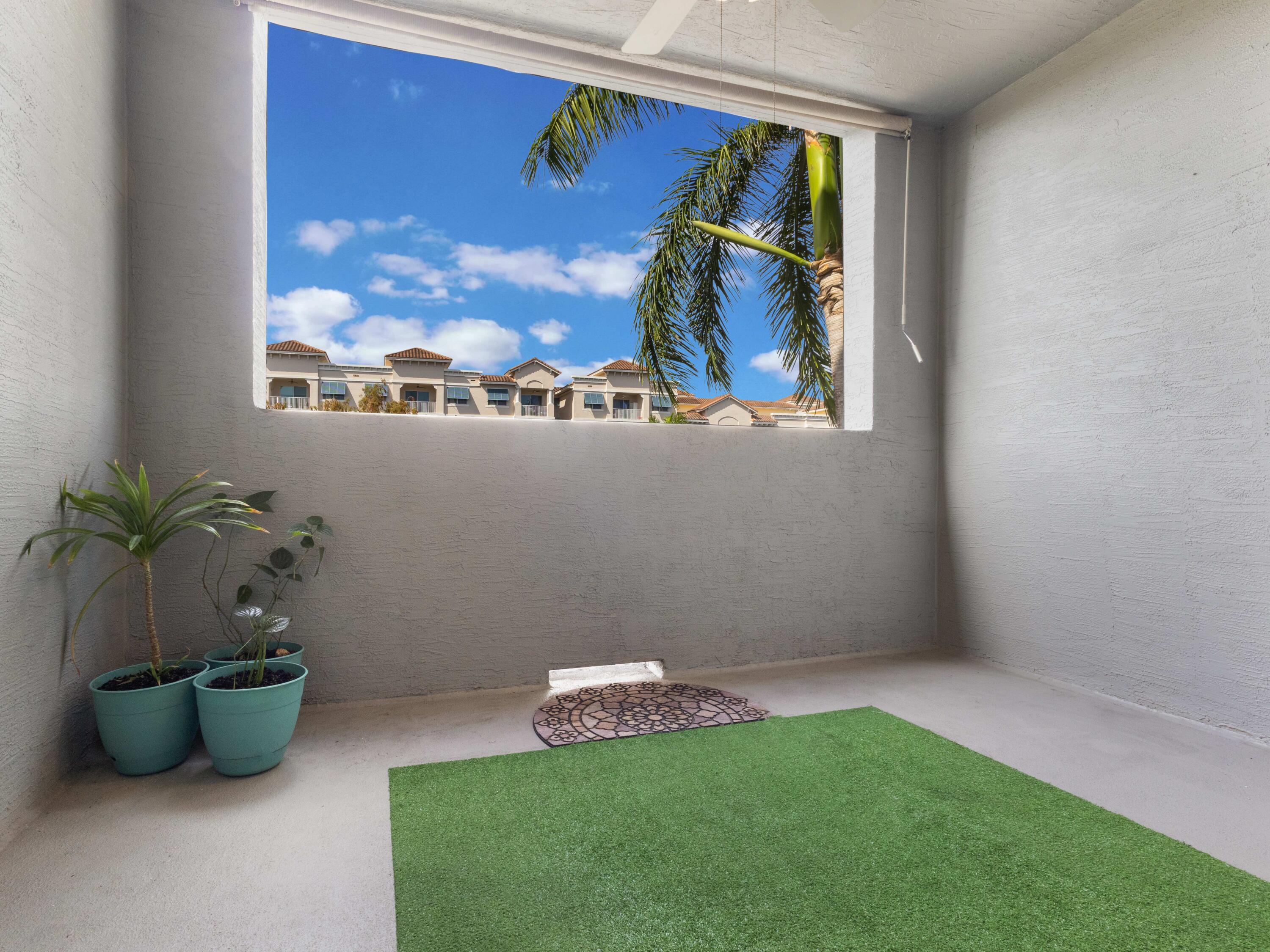 1690 Renaissance Commons Boulevard, Unit 1412 Boynton Beach, FL 33426 - Photo 24 of 42 Balcony 1