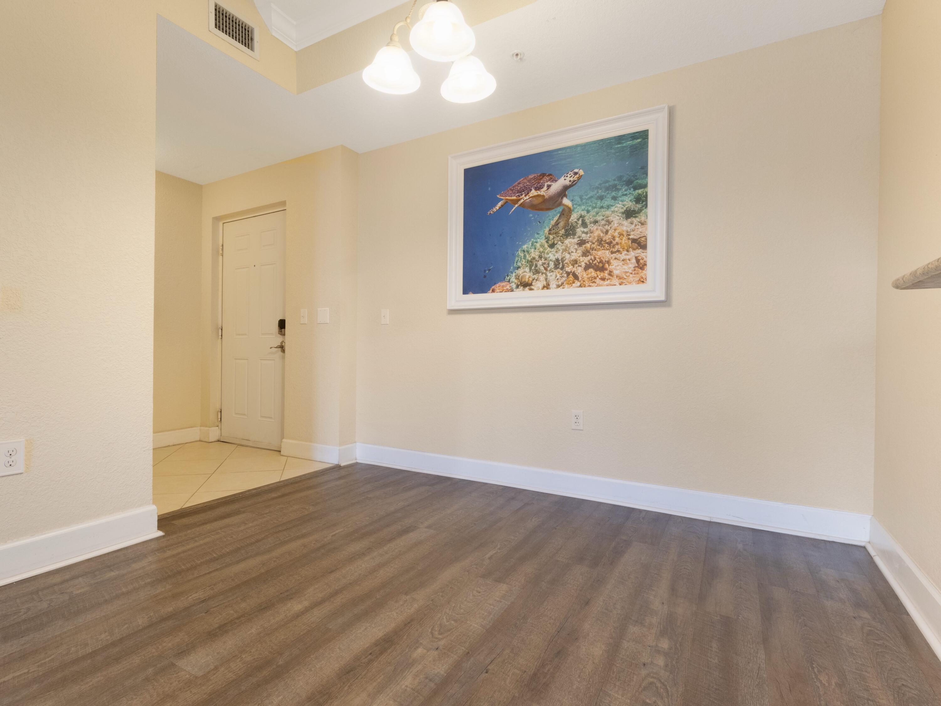 1690 Renaissance Commons Boulevard, Unit 1412 Boynton Beach, FL 33426 - Photo 4 of 42 Dining Foyer