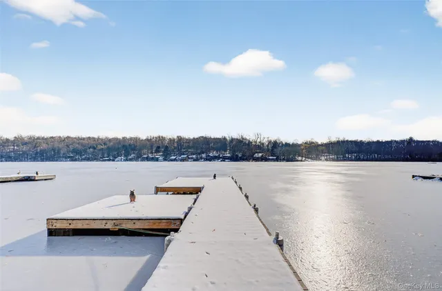 a patio with table and chairs
