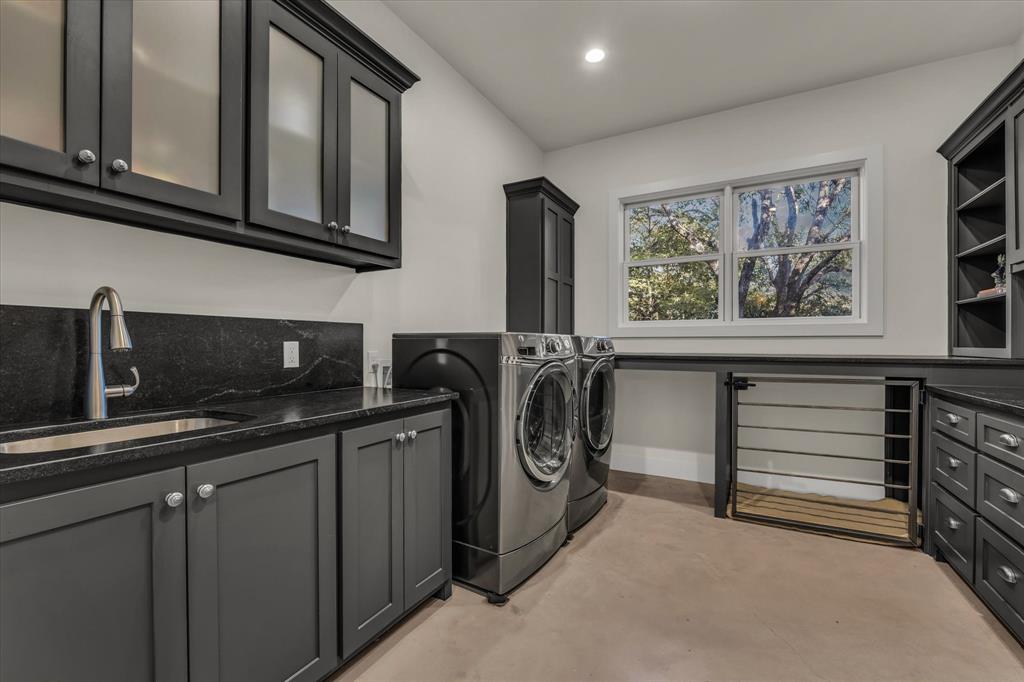 22 Samaritan Way Waco, TX 76705 - Photo 19 of 38 a utility room with cabinets