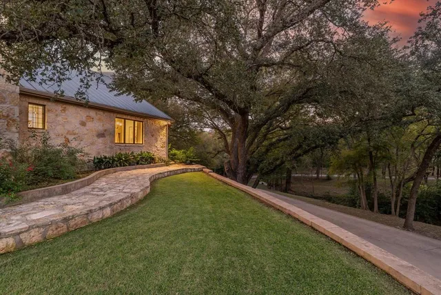 a view of backyard with green space