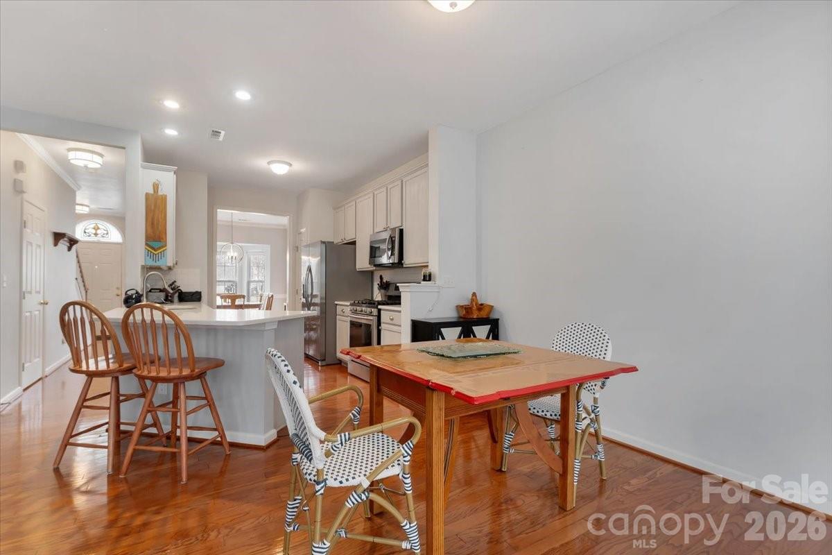 7948 Mariners Pointe Circle Denver, NC 28037 - Photo 11 of 39 a view of a dining room with furniture