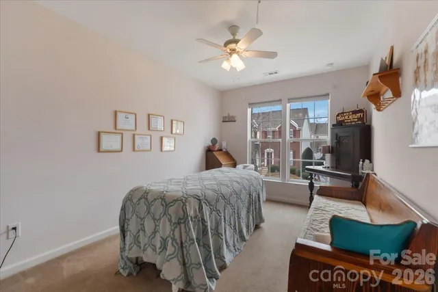 a bed room with a bed and a couch