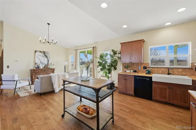 a view of a kitchen and dining room