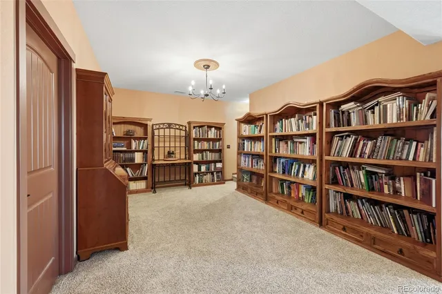 a view of a livingroom with a bookshelf