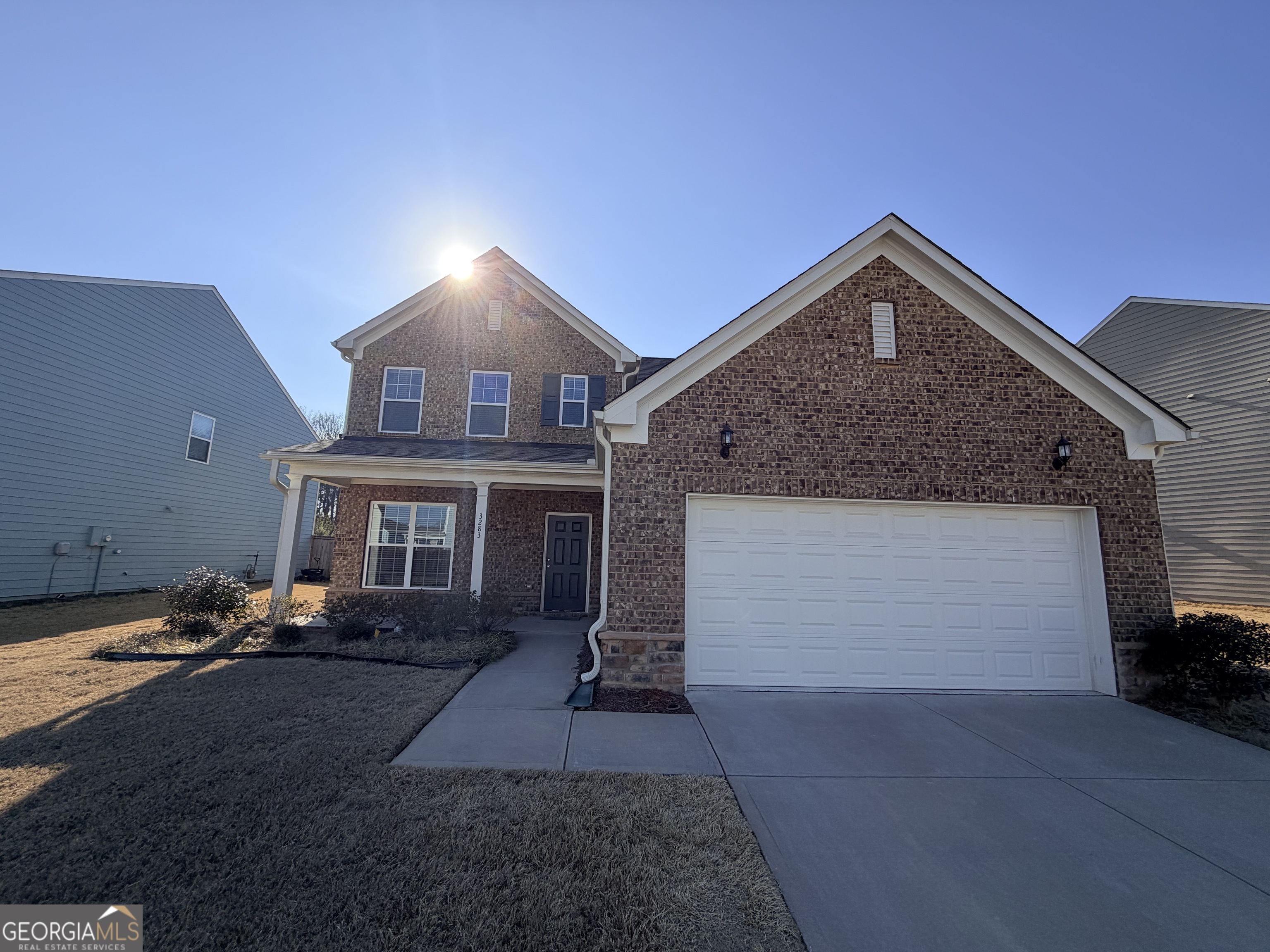 3283 Lowell Road Bethlehem, GA 30620 - Photo 1 of 31 a front view of a house with a yard