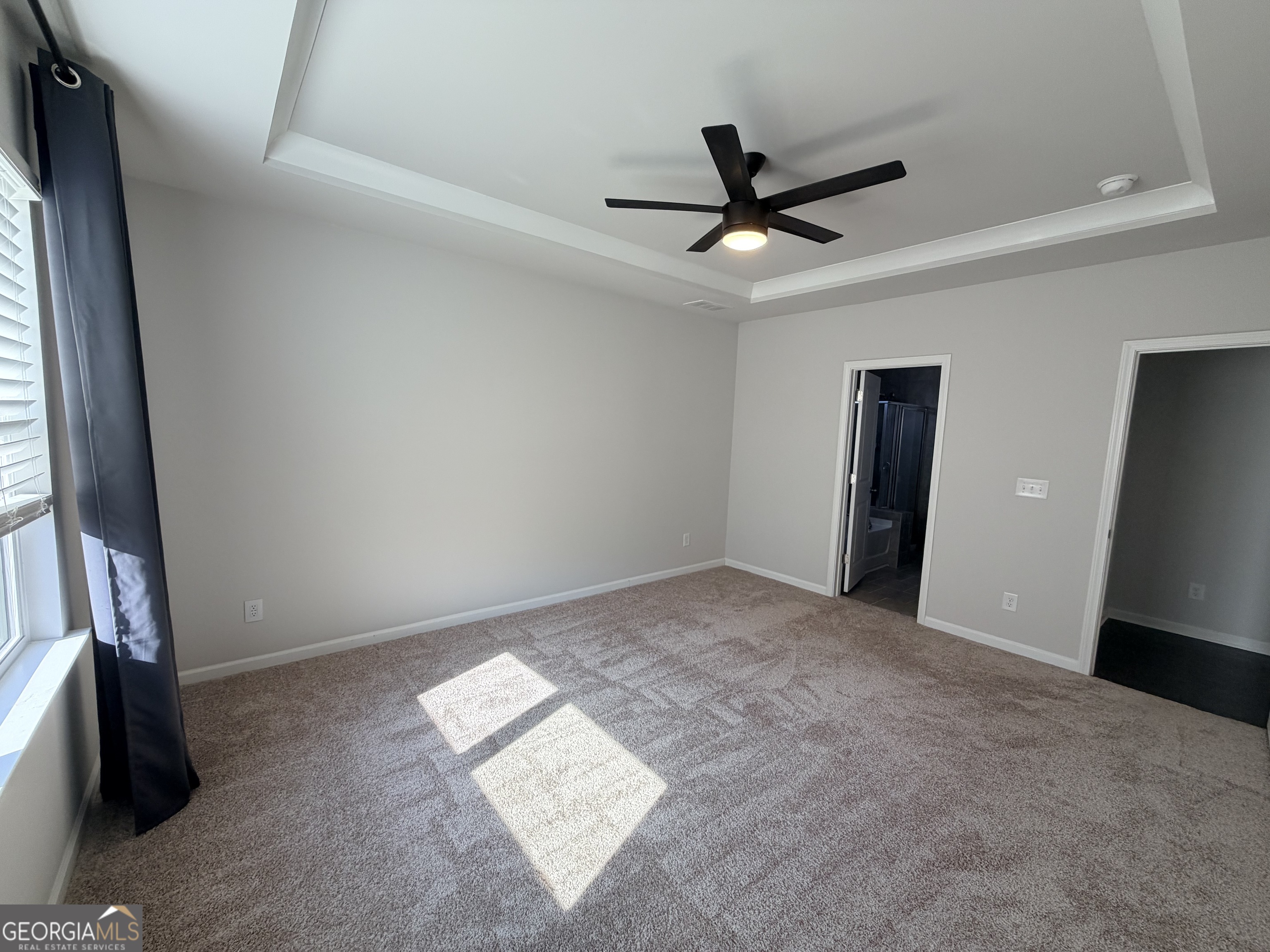 3283 Lowell Road Bethlehem, GA 30620 - Photo 12 of 31 a view of a big room with wooden floor and windows