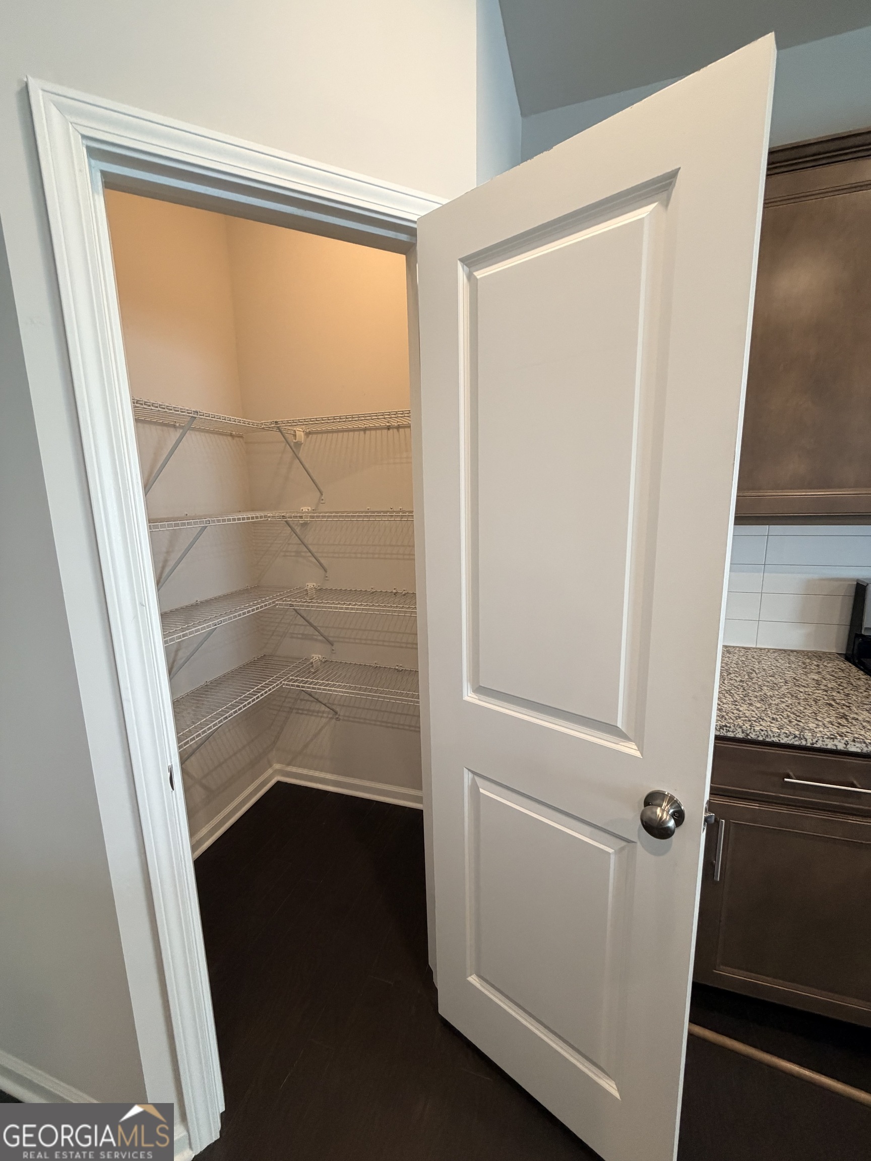 3283 Lowell Road Bethlehem, GA 30620 - Photo 18 of 31 a bathroom with a granite countertop sink and a mirror