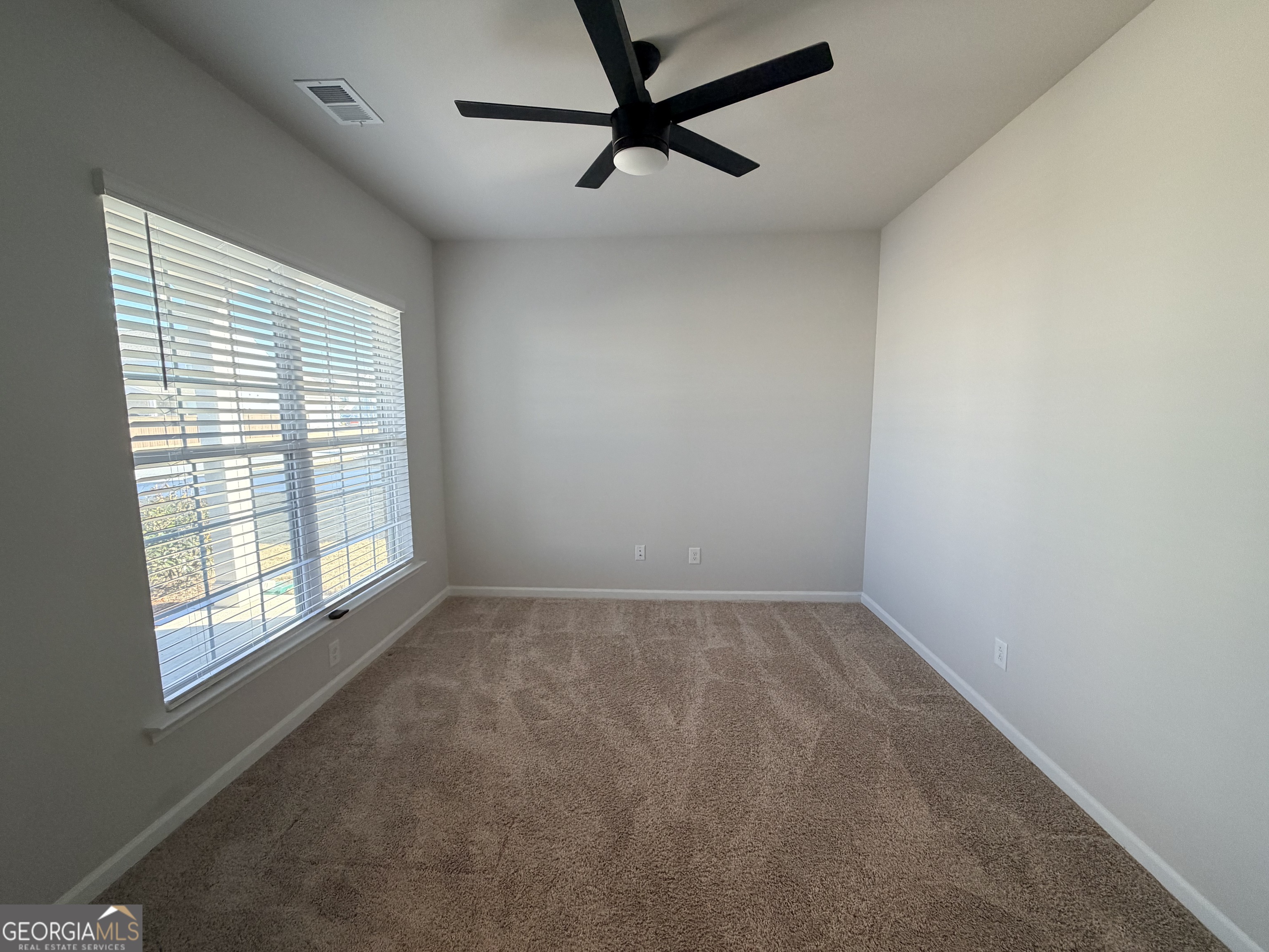 3283 Lowell Road Bethlehem, GA 30620 - Photo 2 of 31 a view of an empty room with a window