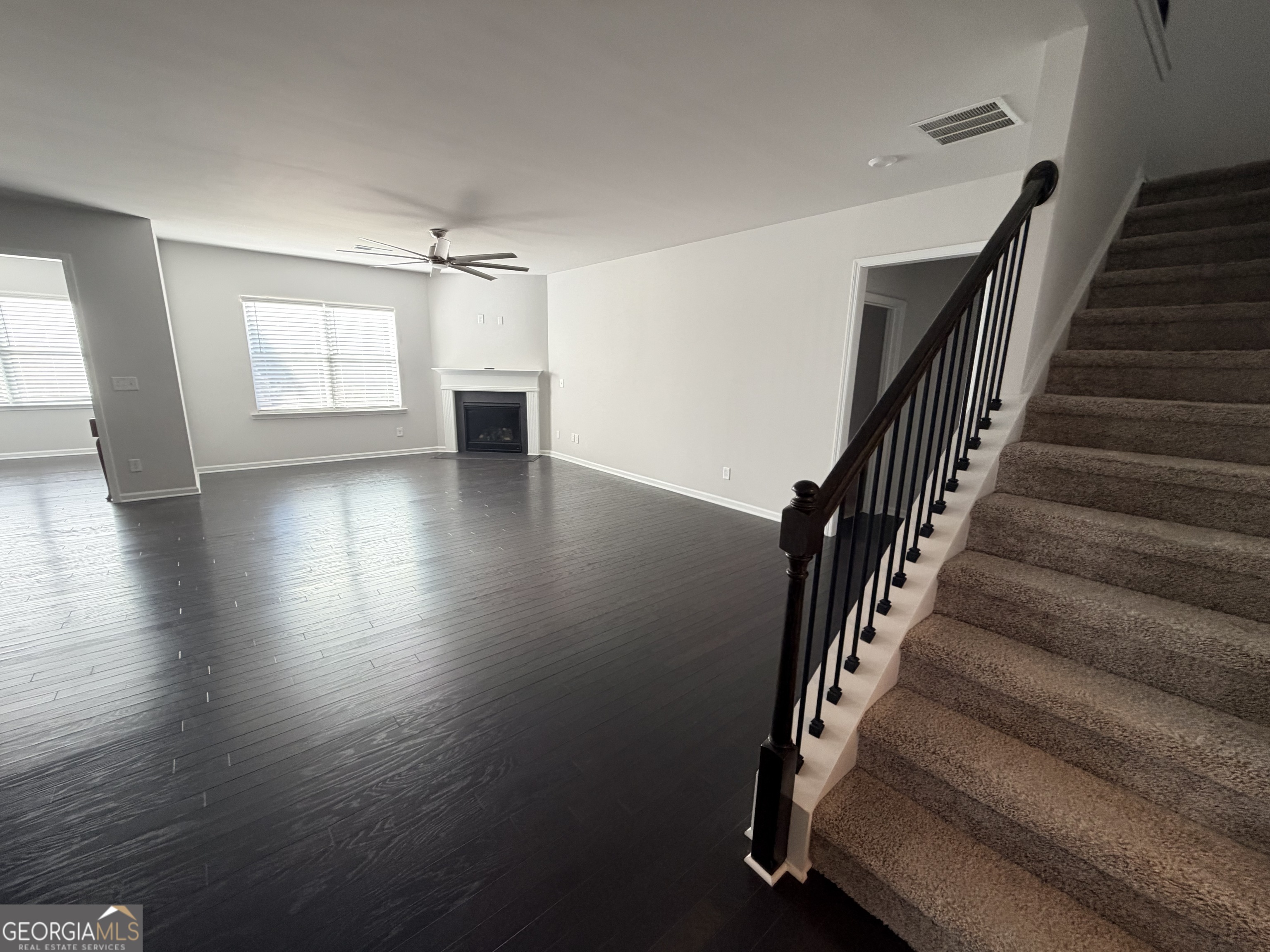 3283 Lowell Road Bethlehem, GA 30620 - Photo 6 of 31 wooden floor in an empty room with a window