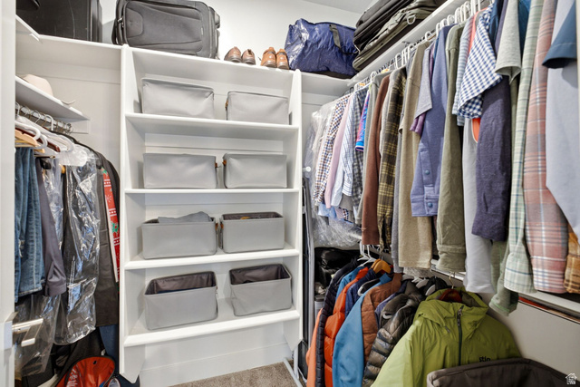 3355 Santa Fe Road Park City, UT 84098 - Photo 19 of 45 Custom closet system featuring multiple levels of hanging rods and integrated shelving units