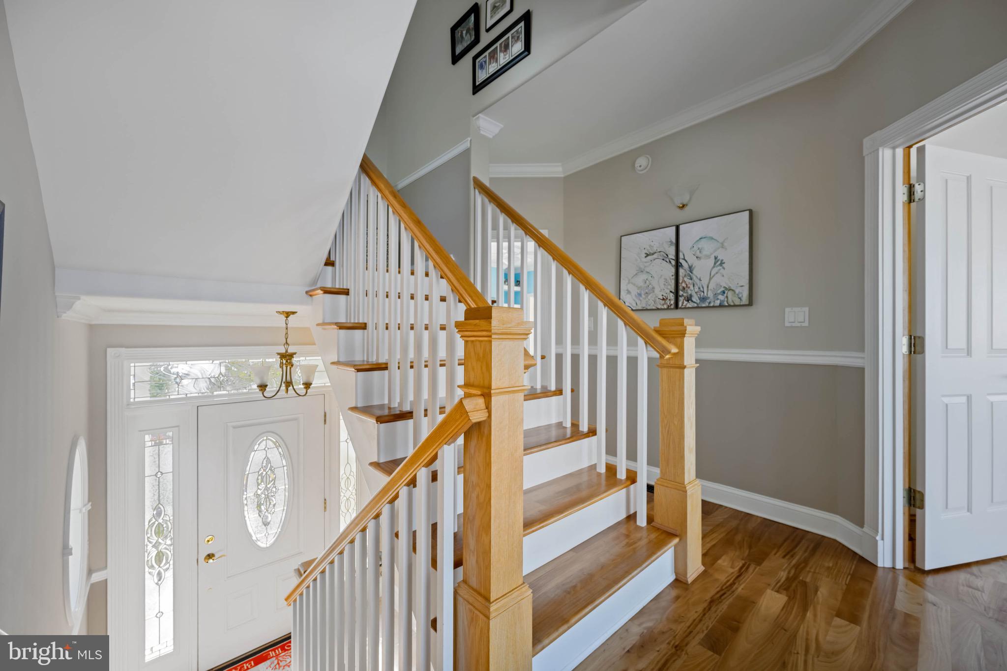 12959 Harbor Road Ocean City, MD 21842 - Photo 22 of 85 a view of entryway and hall with wooden floor