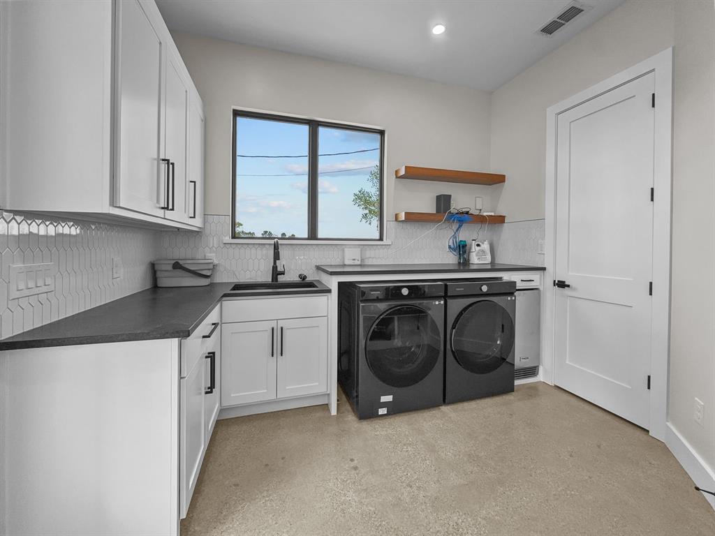 1163 Willow Road Graford, TX 76449 - Photo 11 of 31 a kitchen with stainless steel appliances a stove top oven