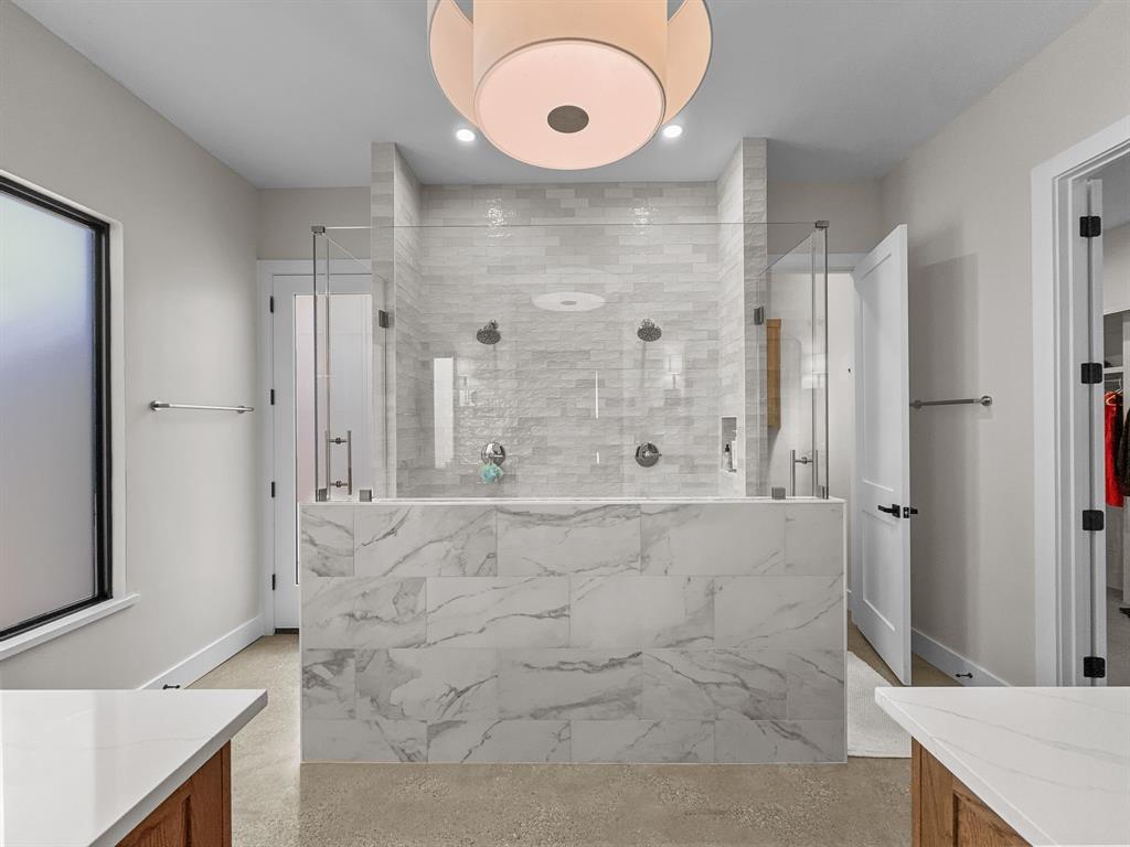 1163 Willow Road Graford, TX 76449 - Photo 14 of 31 a bathroom with a double vanity sink mirror and shower