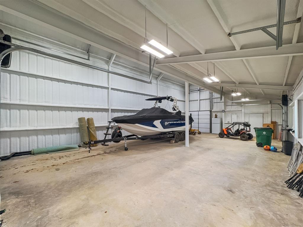 1163 Willow Road Graford, TX 76449 - Photo 30 of 31 a view of a garage with chairs