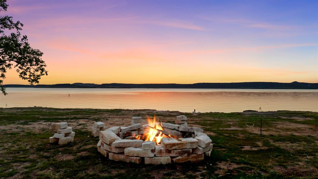 1163 Willow Road Graford, TX 76449 - Photo 31 of 31 a view of a lake in middle of a city