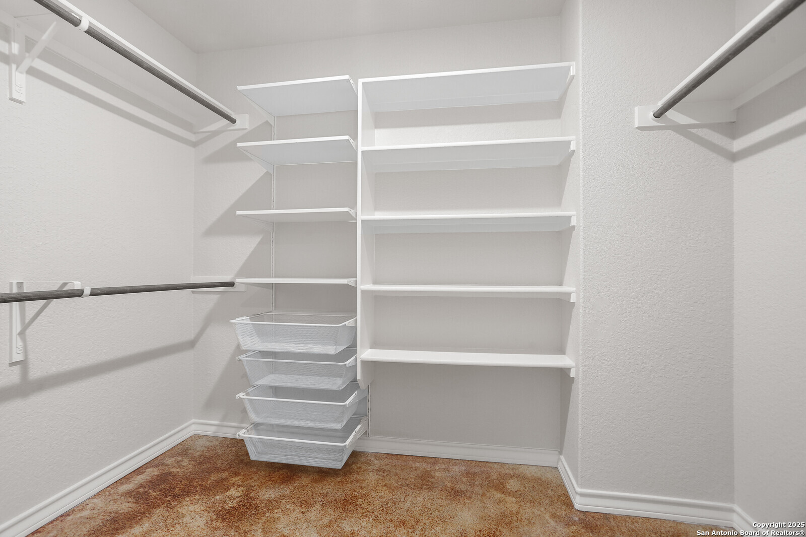 150 Hill Drive Spring Branch, TX 78070 - Photo 13 of 21 a view of walk in closet with empty racks