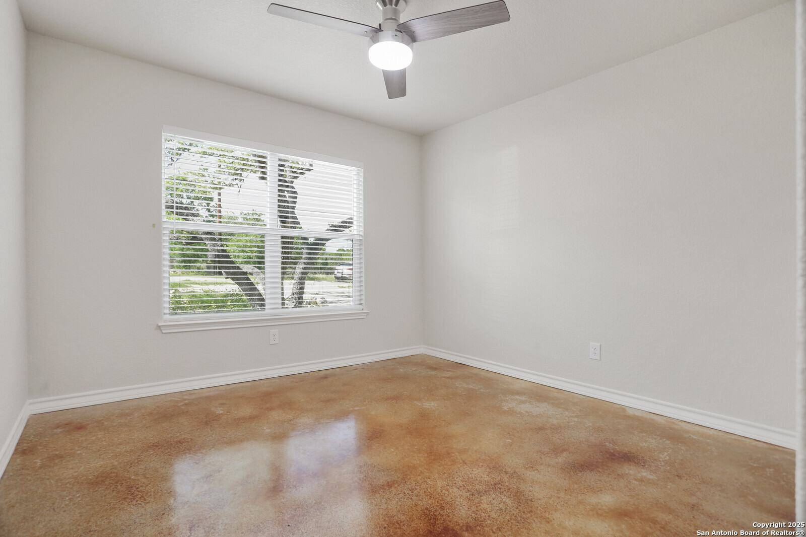 150 Hill Drive Spring Branch, TX 78070 - Photo 16 of 21 a view of an empty room with a window