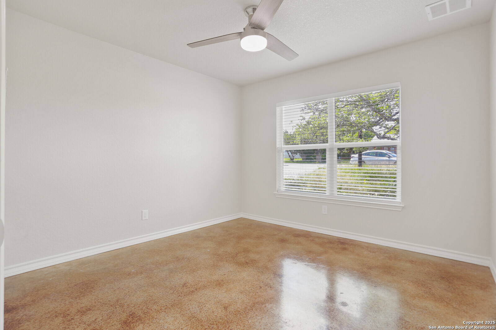 150 Hill Drive Spring Branch, TX 78070 - Photo 17 of 21 an empty room with a window